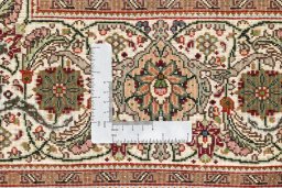 Close-up detail of 2019s Tabriz Silk rug from Iran / Persia showing Wool weave