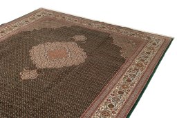 Surface texture of 2019s Tabriz Silk rug with natural Wool and intricate pattern