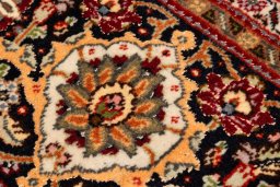Backside of handmade 2018s Tabriz Silk rug showing knot structure and weave density