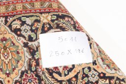 Close-up detail of 2018s Tabriz Silk rug from Iran / Persia showing Wool weave