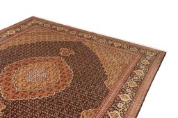 Surface texture of 2018s Tabriz Silk rug with natural Wool and intricate pattern