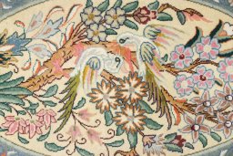 Backside of handmade New Tabriz Silk rug showing knot structure and weave density