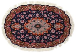 Full view of New Tabriz Silk rug from Iran / Persia, 85 × 55 cm in Dark blue tones