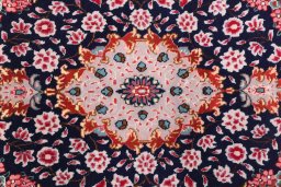 Surface texture of New Tabriz Silk rug with natural Wool and intricate pattern
