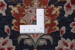 Central medallion detail of New Tabriz Silk rug from Iran / Persia
