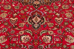 Corner detail of New Tabriz Silk rug showing border pattern and Wool pile