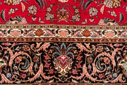 Close-up detail of New Tabriz Silk rug from Iran / Persia showing Wool weave