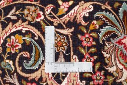 Central medallion detail of New Tabriz Silk rug from Iran / Persia