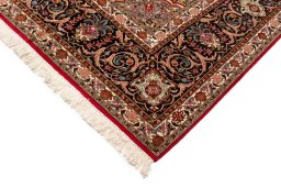Central medallion detail of New Tabriz Silk rug from Iran / Persia