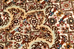 Central medallion detail of New Tabriz Silk rug from Iran / Persia