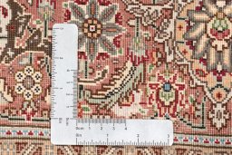 Close-up detail of New Tabriz Silk rug from Iran / Persia showing Wool weave