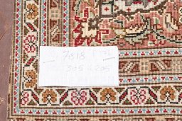 Full view of New Tabriz Silk rug from Iran / Persia, 305 × 205 cm in Beige tones