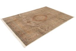 Corner detail of New Tabriz Silk rug showing border pattern and Wool pile