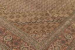 Backside of handmade New Tabriz Silk rug showing knot structure and weave density
