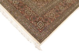 Central medallion detail of New Tabriz Silk rug from Iran / Persia