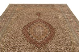 Full view of New Tabriz Silk rug from Iran / Persia, 305 × 205 cm in Beige tones