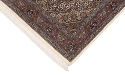 Close-up detail of New Tabriz Silk rug from Iran / Persia showing Wool weave