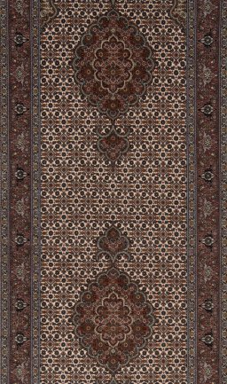 Surface texture of New Tabriz Silk rug with natural Wool and intricate pattern