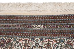 Corner detail of New Tabriz Silk rug showing border pattern and Wool pile
