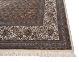 Close-up detail of New Tabriz Silk rug from Iran / Persia showing Wool weave