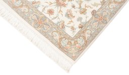 Corner detail of New Tabriz Silk rug showing border pattern and Wool pile