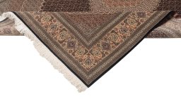 Close-up detail of New Tabriz Silk rug from Iran / Persia showing Wool weave
