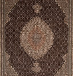 Close-up detail of New Tabriz Silk rug from Iran / Persia showing Wool weave