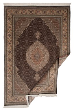 Backside of handmade New Tabriz Silk rug showing knot structure and weave density