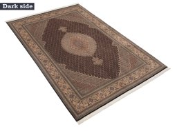 Corner detail of New Tabriz Silk rug showing border pattern and Wool pile