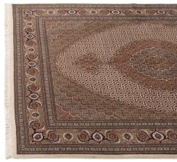 Close-up detail of New Tabriz Silk rug from Iran / Persia showing Wool weave