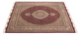 Corner detail of New Tabriz Silk rug showing border pattern and Wool pile