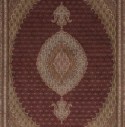 Surface texture of New Tabriz Silk rug with natural Wool and intricate pattern