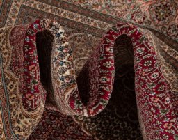 Surface texture of New Tabriz Silk rug with natural Wool and intricate pattern