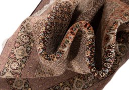 Surface texture of New Tabriz Silk rug with natural Wool and intricate pattern
