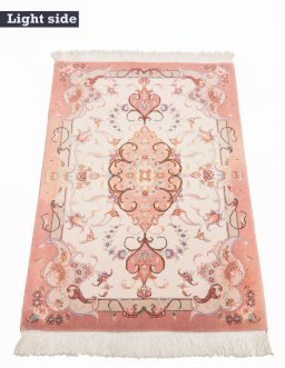 Surface texture of New Tabriz Silk rug with natural Wool and intricate pattern