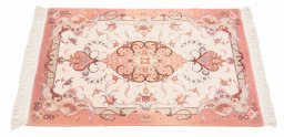Backside of handmade New Tabriz Silk rug showing knot structure and weave density