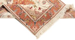 Surface texture of New Tabriz Silk rug with natural Wool and intricate pattern