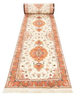 Close-up detail of New Tabriz Silk rug from Iran / Persia showing Wool weave