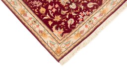 Corner detail of New Tabriz Silk rug showing border pattern and Wool pile