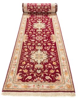 Close-up detail of New Tabriz Silk rug from Iran / Persia showing Wool weave