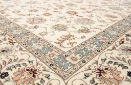 Close-up detail of New Tabriz Silk rug from Iran / Persia showing Wool weave