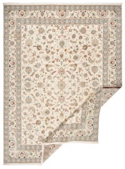 Surface texture of New Tabriz Silk rug with natural Wool and intricate pattern