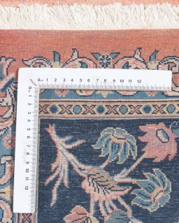 Close-up detail of New Tabriz Silk rug from Iran / Persia showing Wool weave