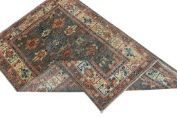 Central medallion detail of New Kazak rug from Pakistan
