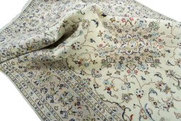 Surface texture of New Kashan rug with natural Wool and intricate pattern