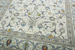 Close-up detail of 2000s Kashan rug from Iran / Persia showing Wool weave
