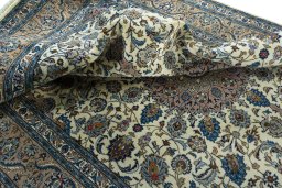 Surface texture of 2000s Kashmar rug with natural Wool and intricate pattern