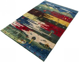 Corner detail of 2000s Persian Gabbeh rug showing border pattern and Wool pile