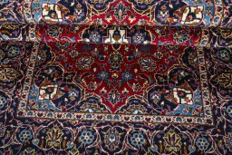 Close-up detail of 2000s Kashan rug from Iran / Persia showing Wool weave
