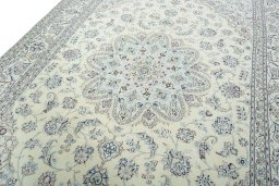 Backside of handmade 2000s Nain rug showing knot structure and weave density